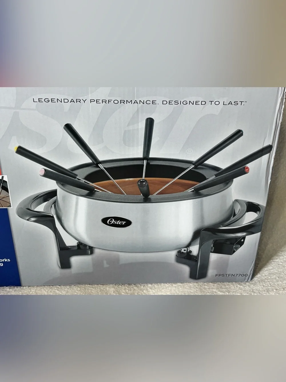 Oster Silver Stainless Steel Chocolate Fondue Pot with Black Fork Handles